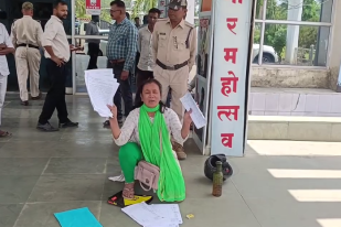 Woman Reaches Collectorate with Petrol and Matches during public hearing MP News