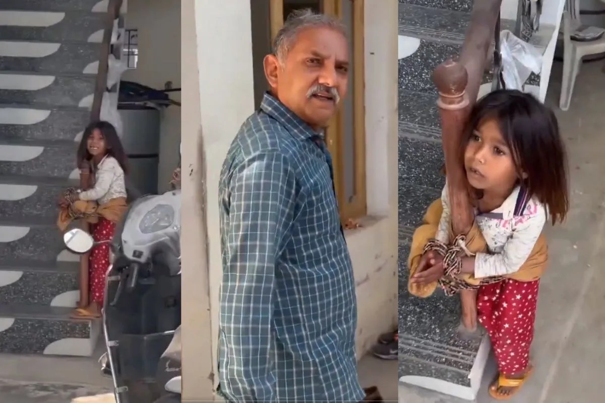 girl tied with chain