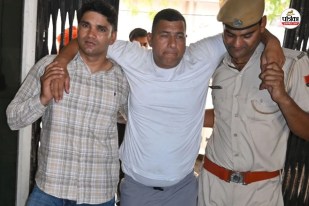Bharatpur police big success extortion gang arrested leader Vinod Pathena limps to court
