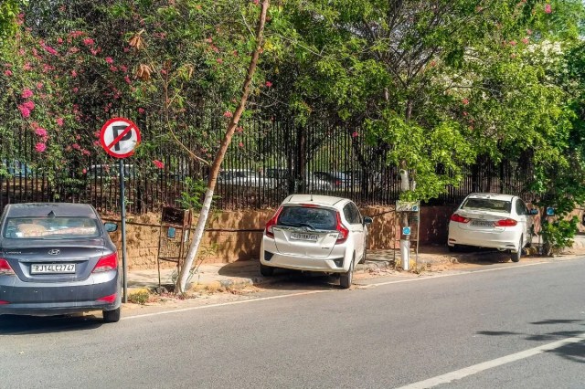Vehicles parked on footpath