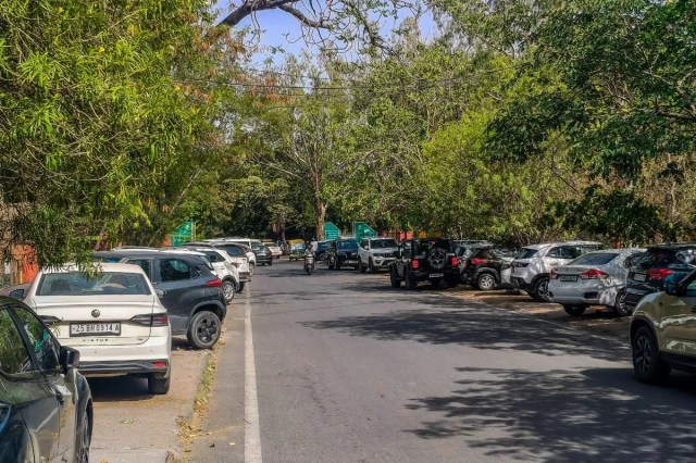 Vehicles parked on footpath