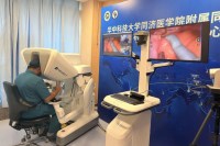 Indian doctor performs remote robotic surgery from Wuhan on Hyderabad.