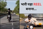 Girl performing Statue of Liberty pose on moving Bullet bike in Jaipur