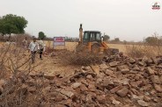 Bulldozer Action on Illegal Plotting