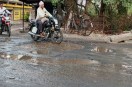 Despite repeated instructions, the road has not been built or repaired, and the wheels of vehicles are stuck in potholes.