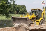 bijnor illegal colony bulldozer action dhampur mohra village