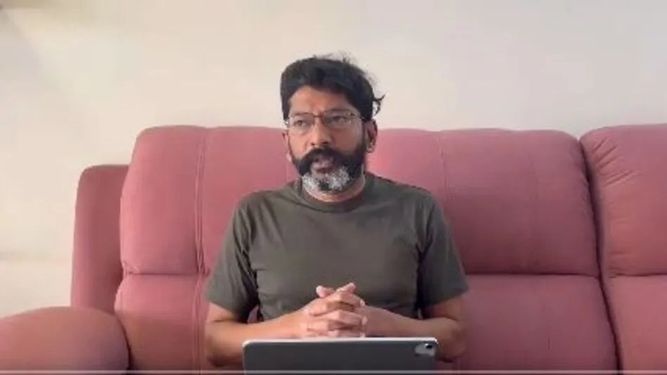 Who is A Shankar Savukku
