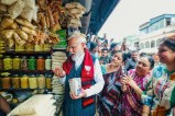 PM Narendra Modi having jhalmuri