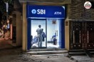 viral video of hair cutting saloon inside sbi atm booth