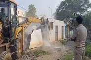 Bulldozer action video, Bulldozer run on encroachment