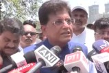 Union Minister Piyush Goyal planting a tree for sustainability,Minister Piyush Goyal participating in the green initiative.
