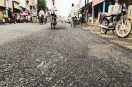 Quality of ₹5-crore road questioned; complaints regarding large aggregate and insufficient bitumen in the surfacing.