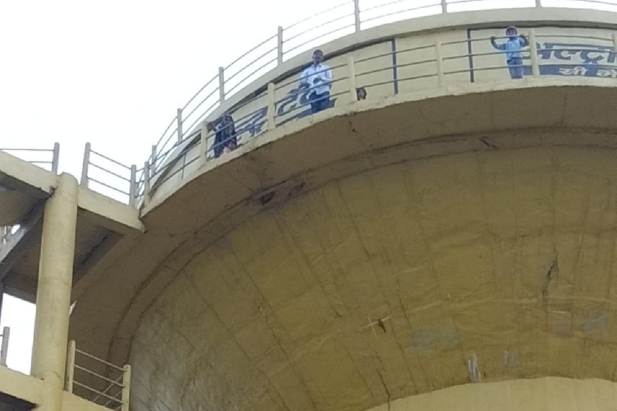 family climbs water tank alleges death threats from accused out on bail rajgarh collectorate chaos