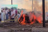 Couple cremated on same pyre 3 year old son gave mukhagini Dabra Road Accident