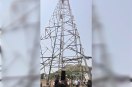 youth climbs mobile tower