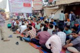 बुटाटी मंदिर के बाहर धरना देते ग्रामीण। - फाइल फोटो