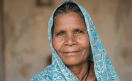 old woman murdered stone attack pm awas yojana money