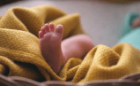 newborn baby abandoned roadside rescued by stranger dhar