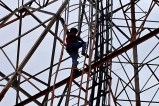 Husband Climb 130 Foot Tower
