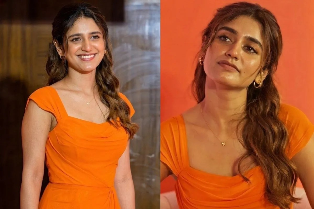 Woman in orange dress, smiling.