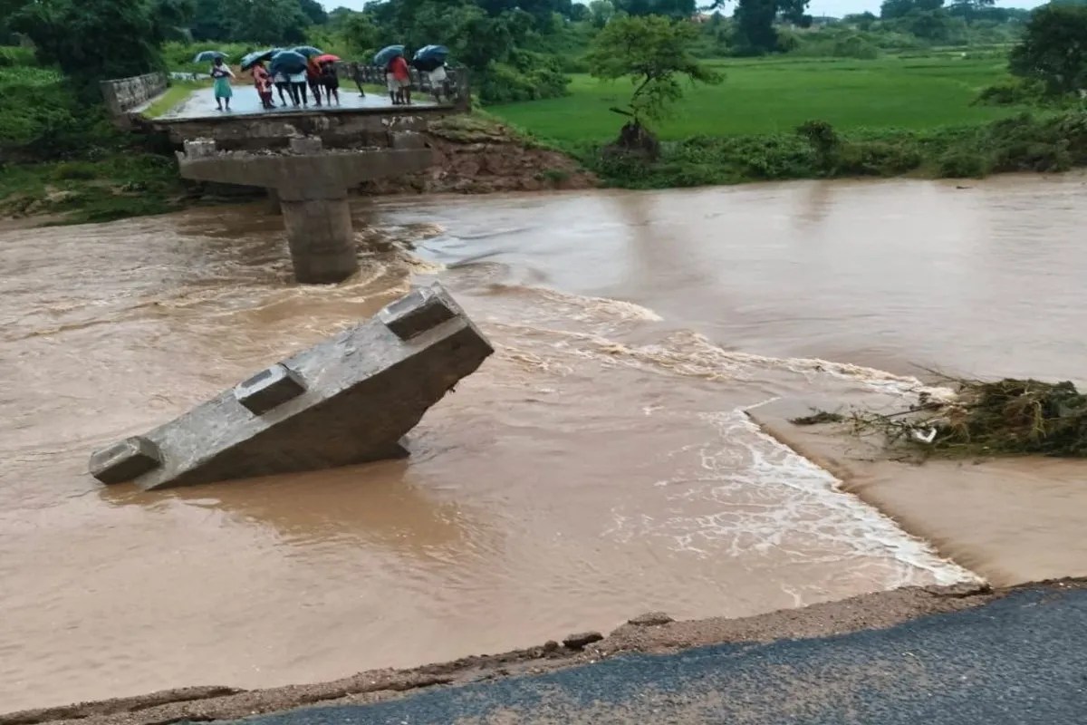 Bridge washed away in heavy rain
