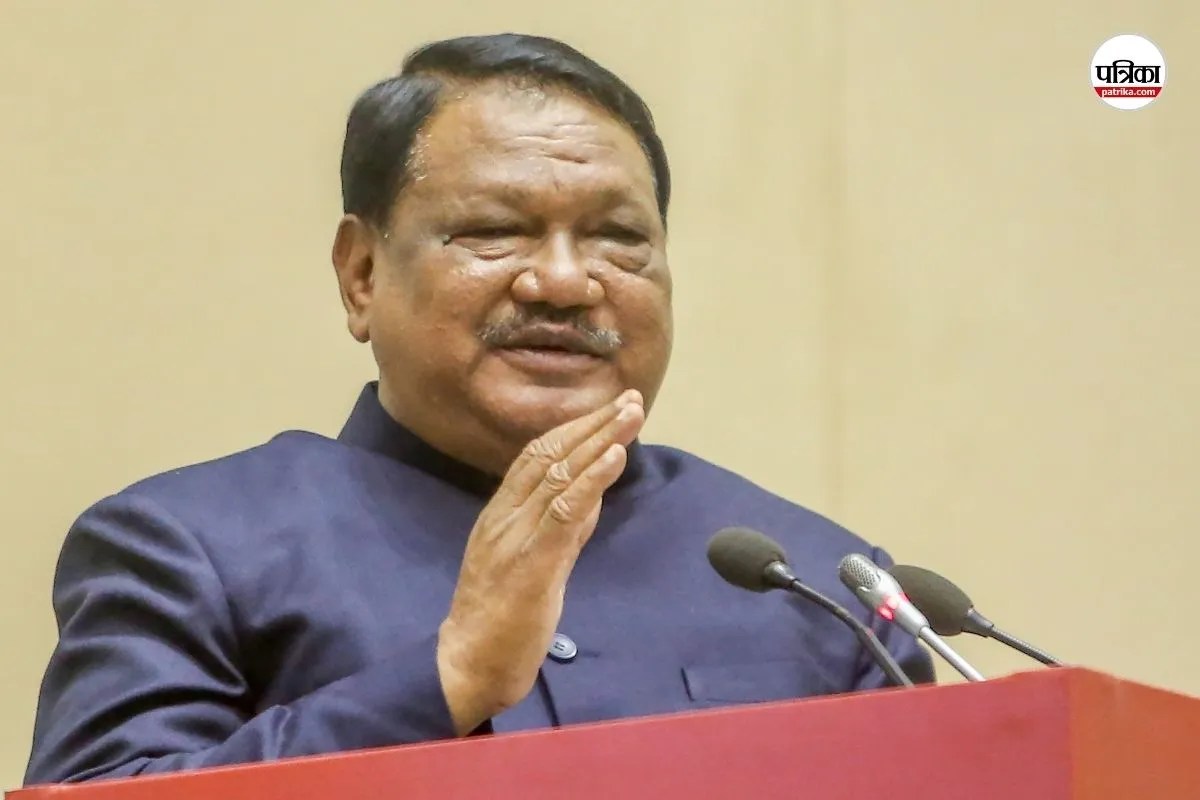 Man speaking at a podium