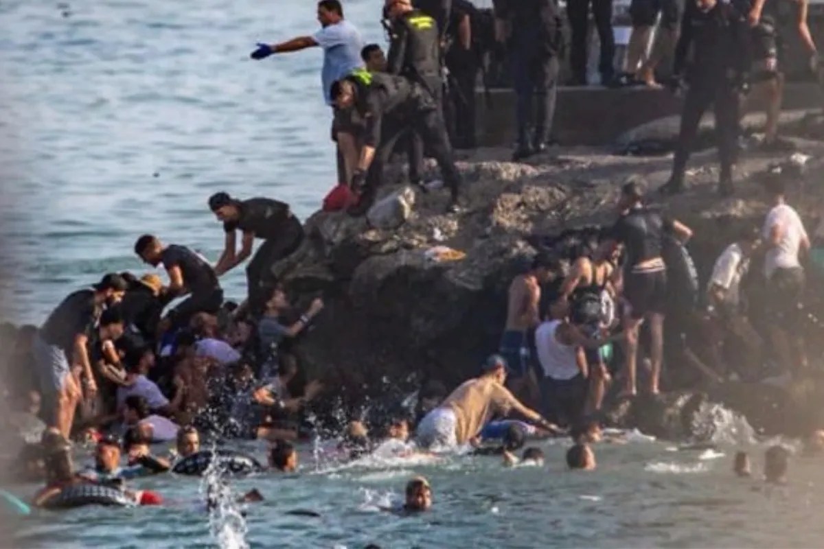 Migrants Swimming to Spain