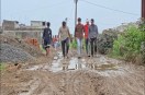 Plots were sold at exorbitant prices with promises of amenities, yet the condition of the road is such that even transporting a sick person to the hospital is difficult.