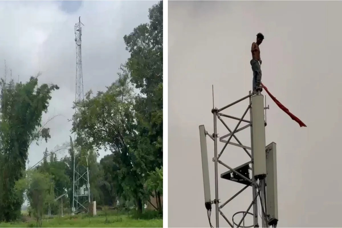 Young man climbed on mobile tower