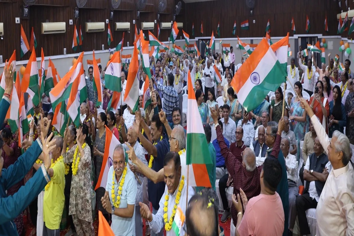 Elderly residents of old-age homes dance to patriotic songs, holding the Tricolour