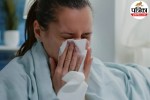 covering mouth while coughing showing how H. influenzae can spread