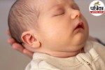 infant’s larger-than-average head circumference indicating macrocephaly
