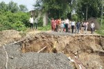 Road washed away by strong currents near Patolpura Talabdi in Anand