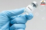 Medical professional administering a vaccine shot to a patient to build immunity against diseases