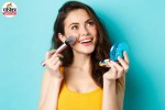 Assorted makeup products with expiry symbols next to a young child getting light safe makeup applied carefully