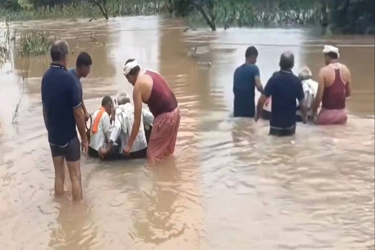 villagers use kadhai to cross water