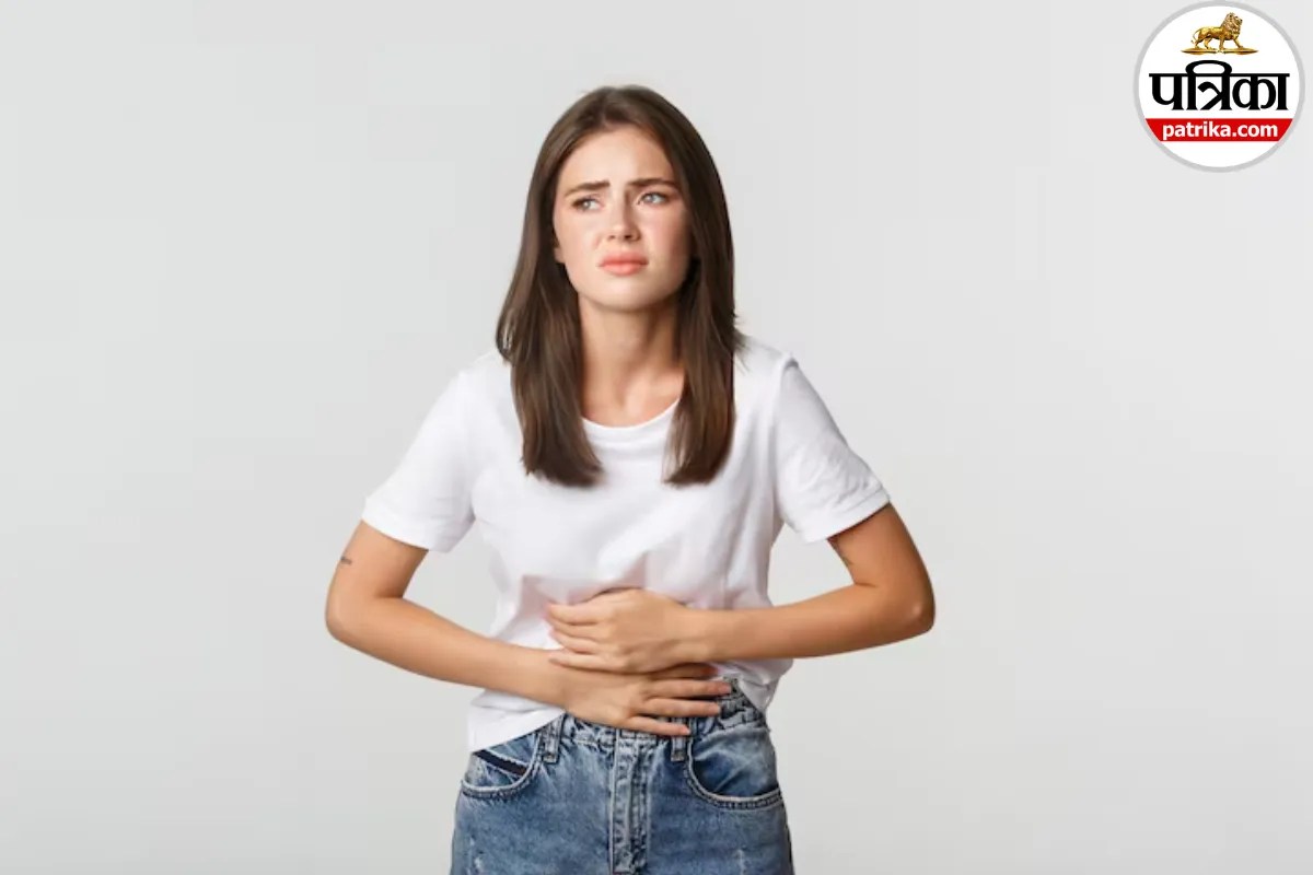 showing a girl suffering from stomach pain