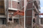 Bulldozer run on encroachments