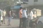 Mask distribution on Ambikapur dusty road