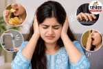 A person feeling annoyed and covering their ears due to triggering sounds like chewing or breathing