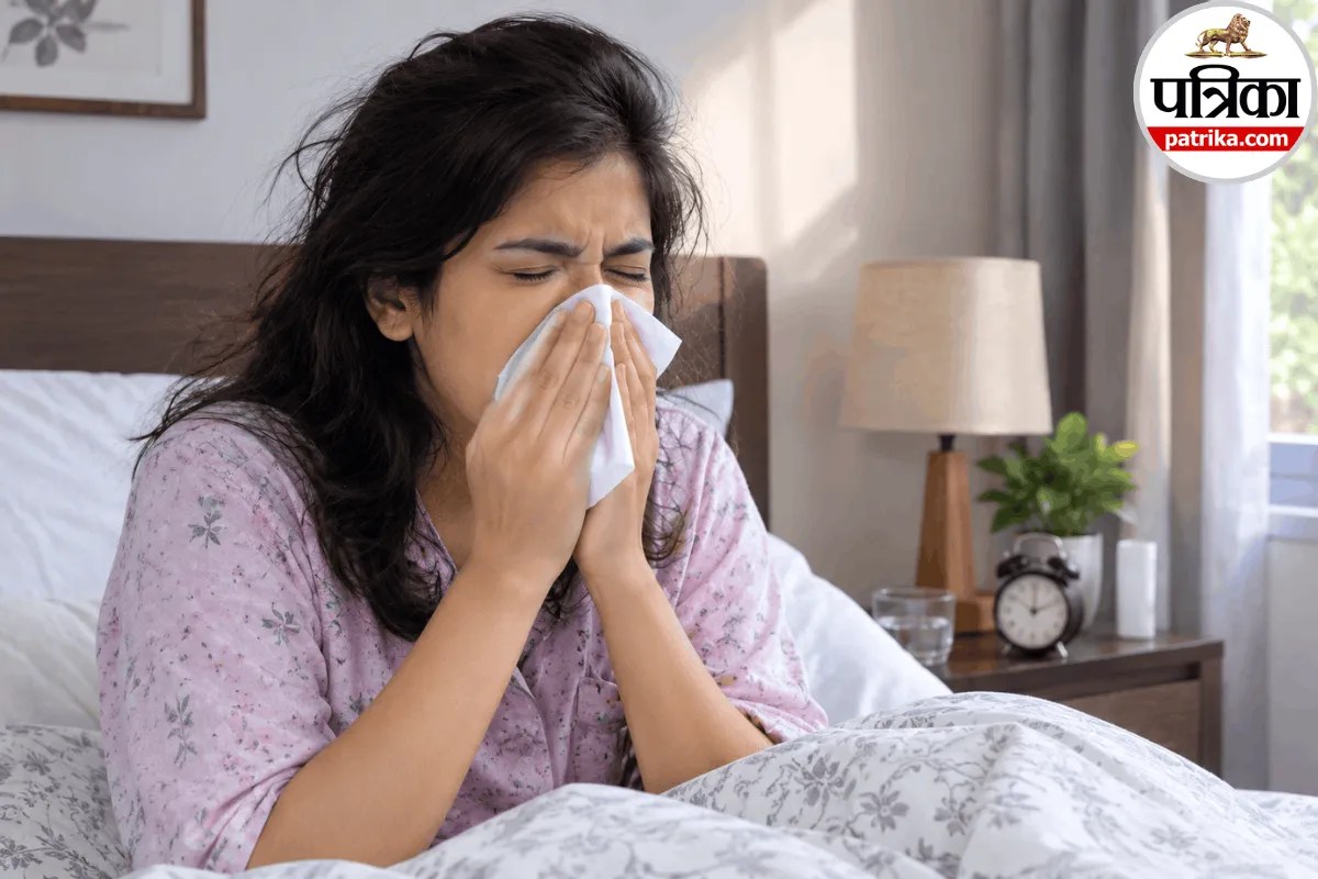 Person sneezing in bed in the morning due to dust mites and morning allergies vs asthma symptoms