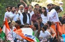 Neha Bora with Rahul Gandhi during opposition march