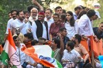 Neha Bora with Rahul Gandhi during opposition march