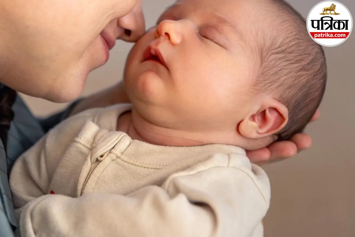 Close-up of a newborn baby showing lower lip pits associated